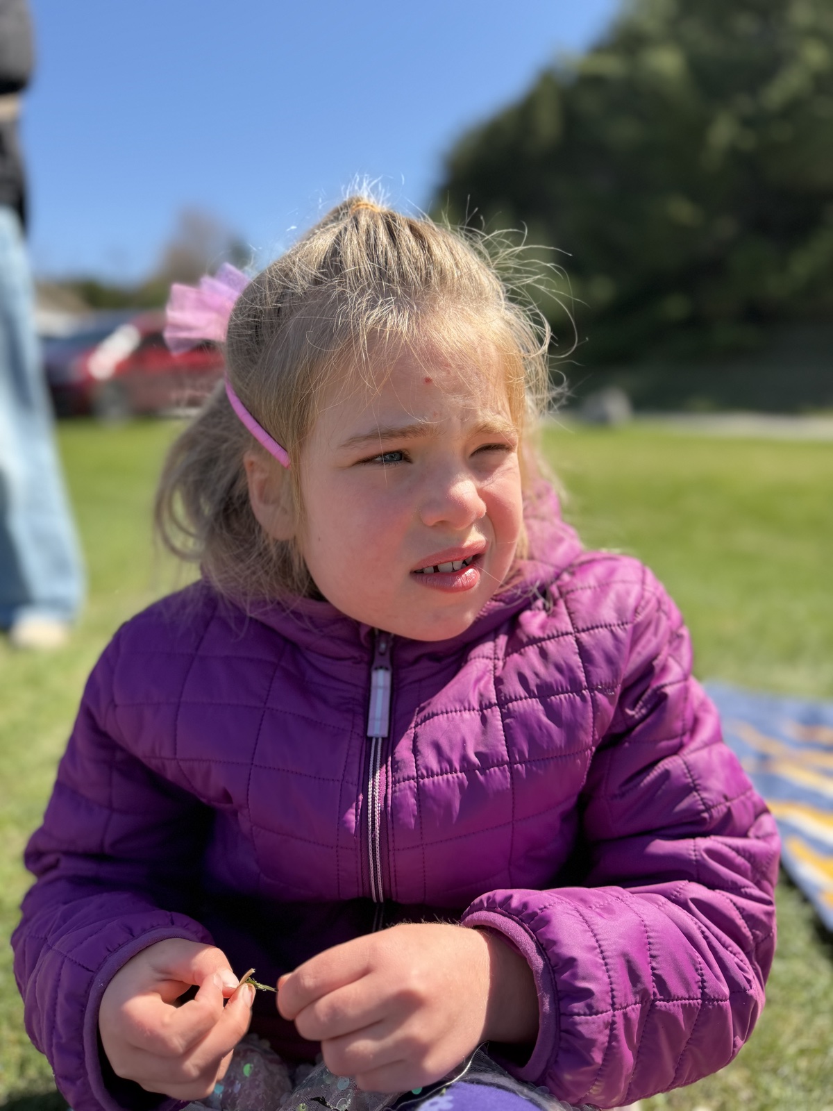 Elle outdoors at an Easter egg hunt