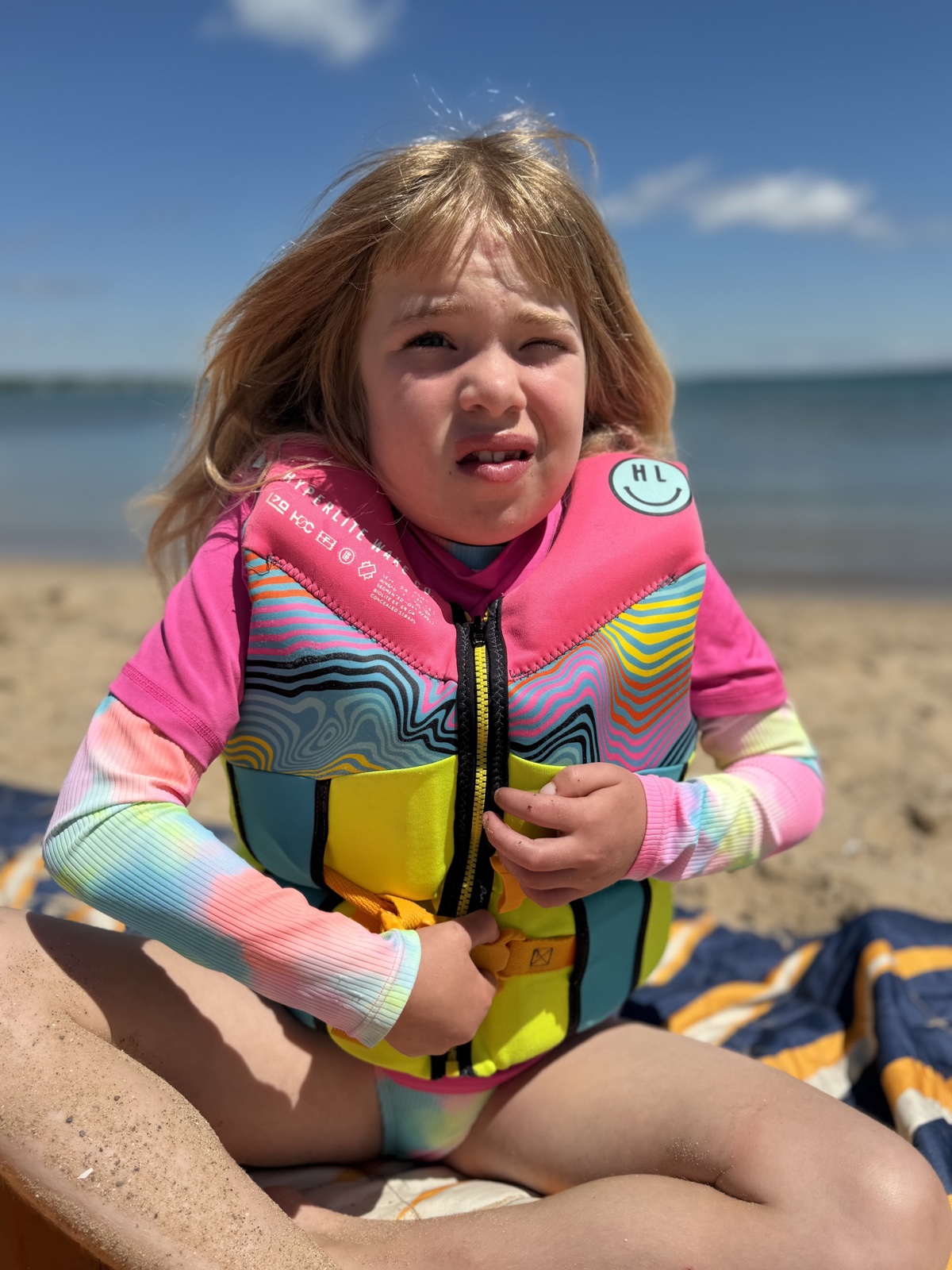 Elle wearing a life vest at the lake